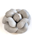 Grey leather camellia brooch with sculptural layered petals and matte finish