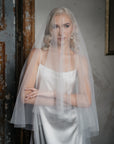 NEVE crystal wedding veil blusher worn over face ceremony style with crystal sparkle