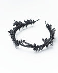 Black laurel leaf crown on a white background