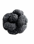 Handmade black tweed camellia brooch with subtle silver sparkles, textured fabric flower pin for high-fashion elegance