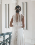 Elizabeth drape wedding veil for open-back dress, double comb English tulle veil showing U-shape curve.