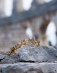 Handmade gold laurel leaf bridal headpiece made from brass leaves and gold flowers