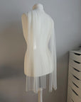 Minimalist bridal look with sheer wedding scarf and Preciosa pearls