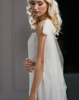 Modern bride in non-veil wedding look with PARIS detachable cape