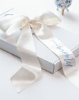 Personalized wedding veil hanger with embroidered satin ribbon — ivory color