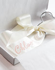Embroidered satin ribbon bow on personalized veil hanger