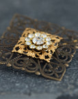 Brass boutonniere for groom with filigree and crystal