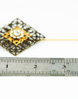 VERITAS sacred geometry wedding boutonniere in brass with glass crystals