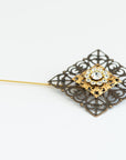 VERITAS sacred geometry wedding boutonniere in brass with glass crystals