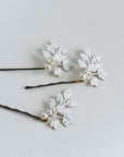 White bridal hair pins with crystals and pearls