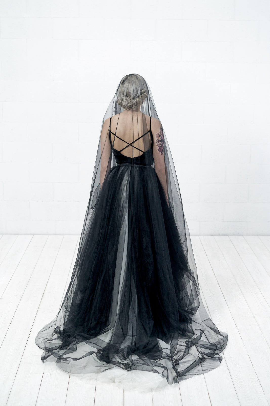 Back view of ALISSA black wedding veil with soft oval cut