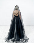 Back view of ALISSA black wedding veil with soft oval cut