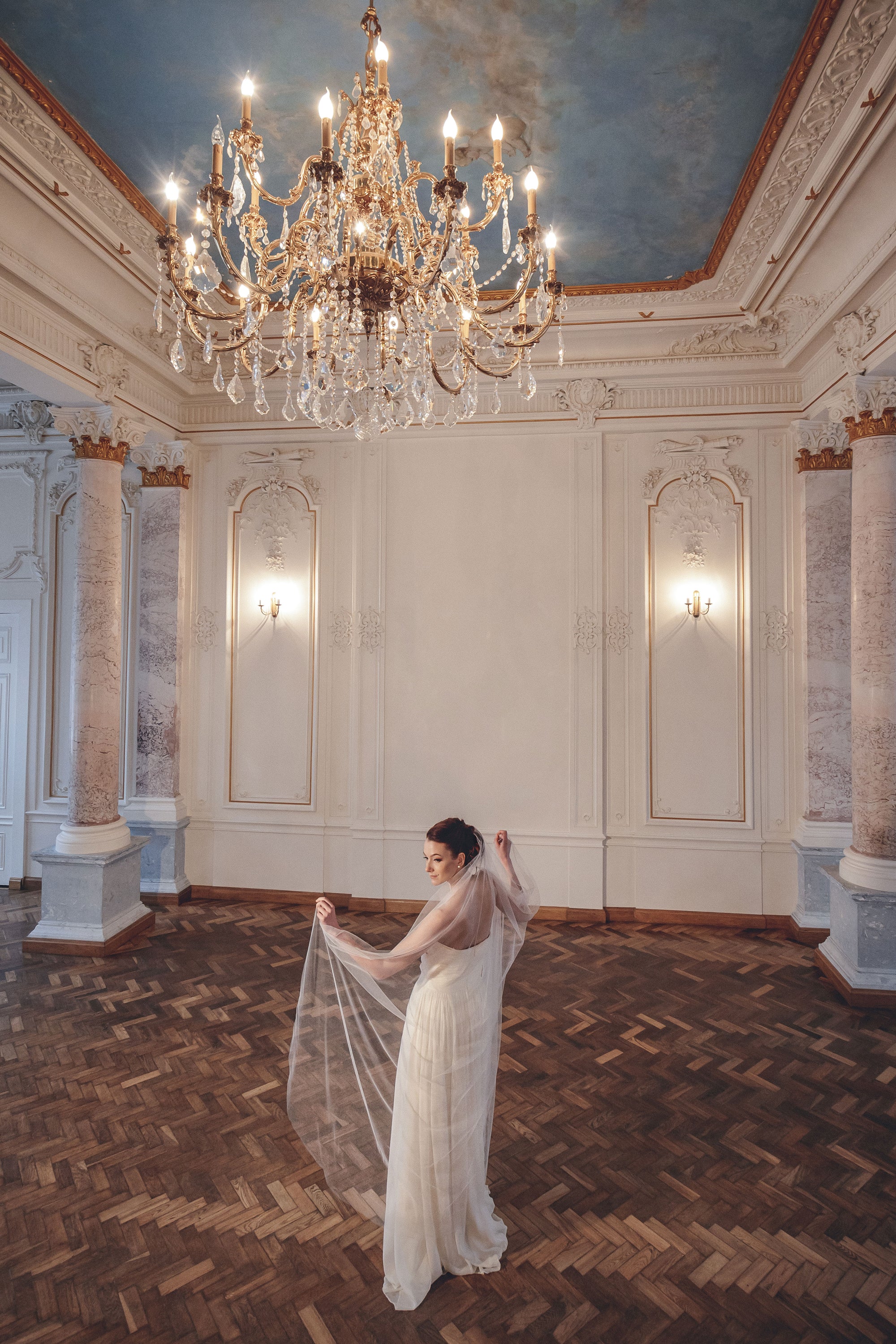 Bride wearing ASTRIDE minimalist English tulle veil in iv