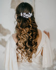 Model wearing LIUCINA floral bridal hair vine with white silk velvet flowers and pearls