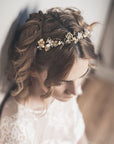 SYBIL gold floral headband styled with lace wedding dress