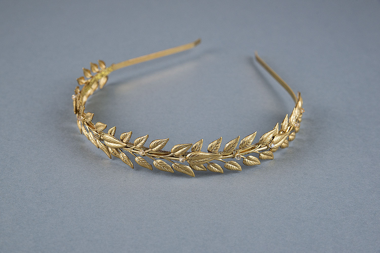 Handcrafted gold leaf headpiece with clear crystals - close-up