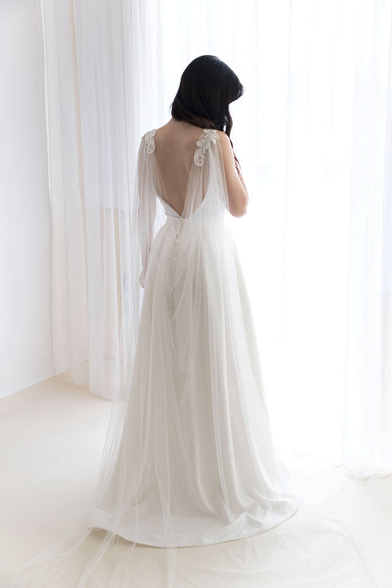 Bridal cape veil with lace trim on model, wedding cape alternative in soft white tulle