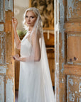 Bride with Marlena Juliet cap veil with crystals and pearls in soft English tulle