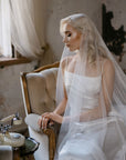 Side view of Marlena Juliet cap veil – pearls and crystals in natural light