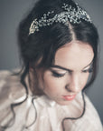 Bride wearing the LILY silver lily of the valley bridal tiara with Austrian crystals, romantic wedding headpiece.