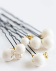 Close-up of ALSA pearl pins set for weddings