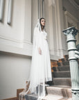 Lightweight English tulle wedding veil — raw curved edge detail