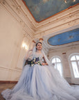 Classic bride wearing serenity blue English tulle veil with blue wedding gown