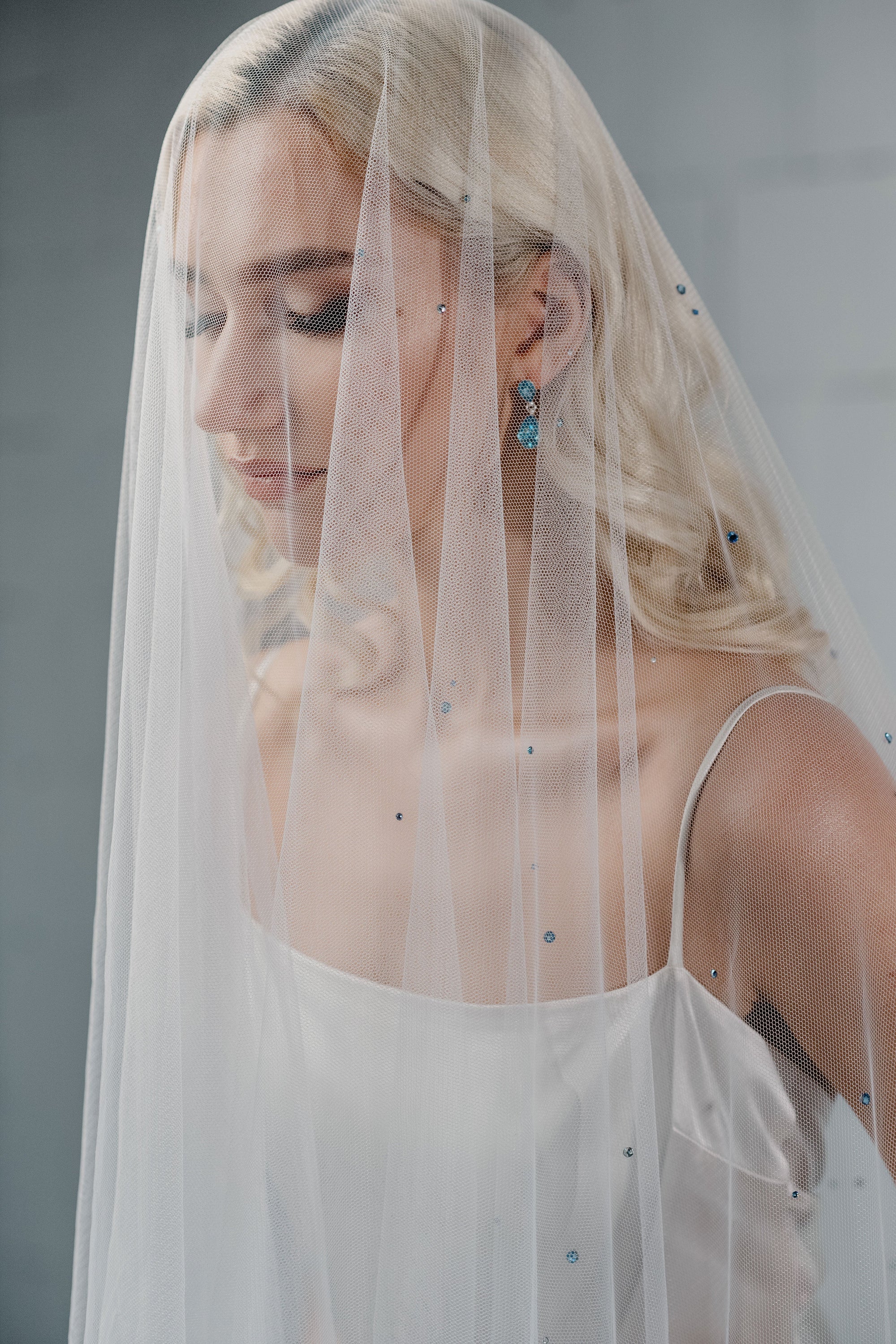 Real bride wearing soft English veil — quiet bridal look