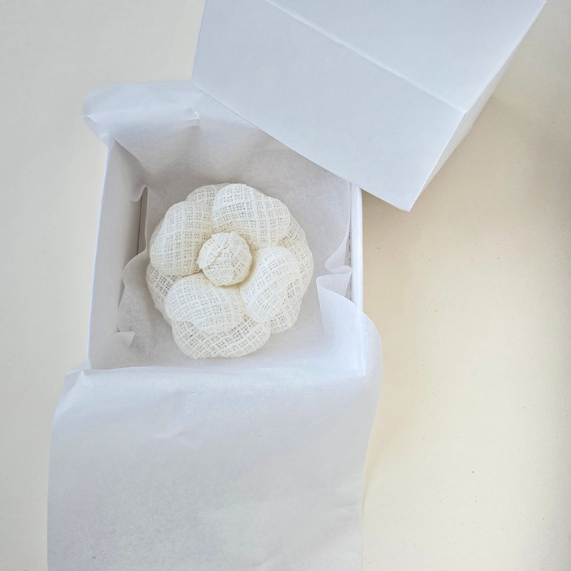 Ivory camellia brooch packaged in gift box ready for gift