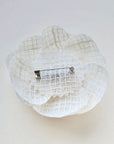 Ivory camellia brooch with pin fastening on back