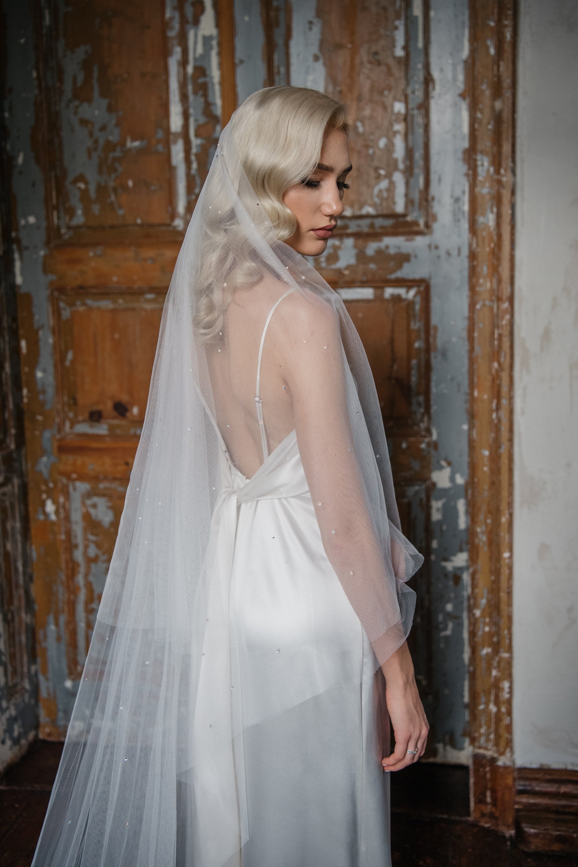 NEVE crystal veil side view showing convertible blusher and chapel length drape