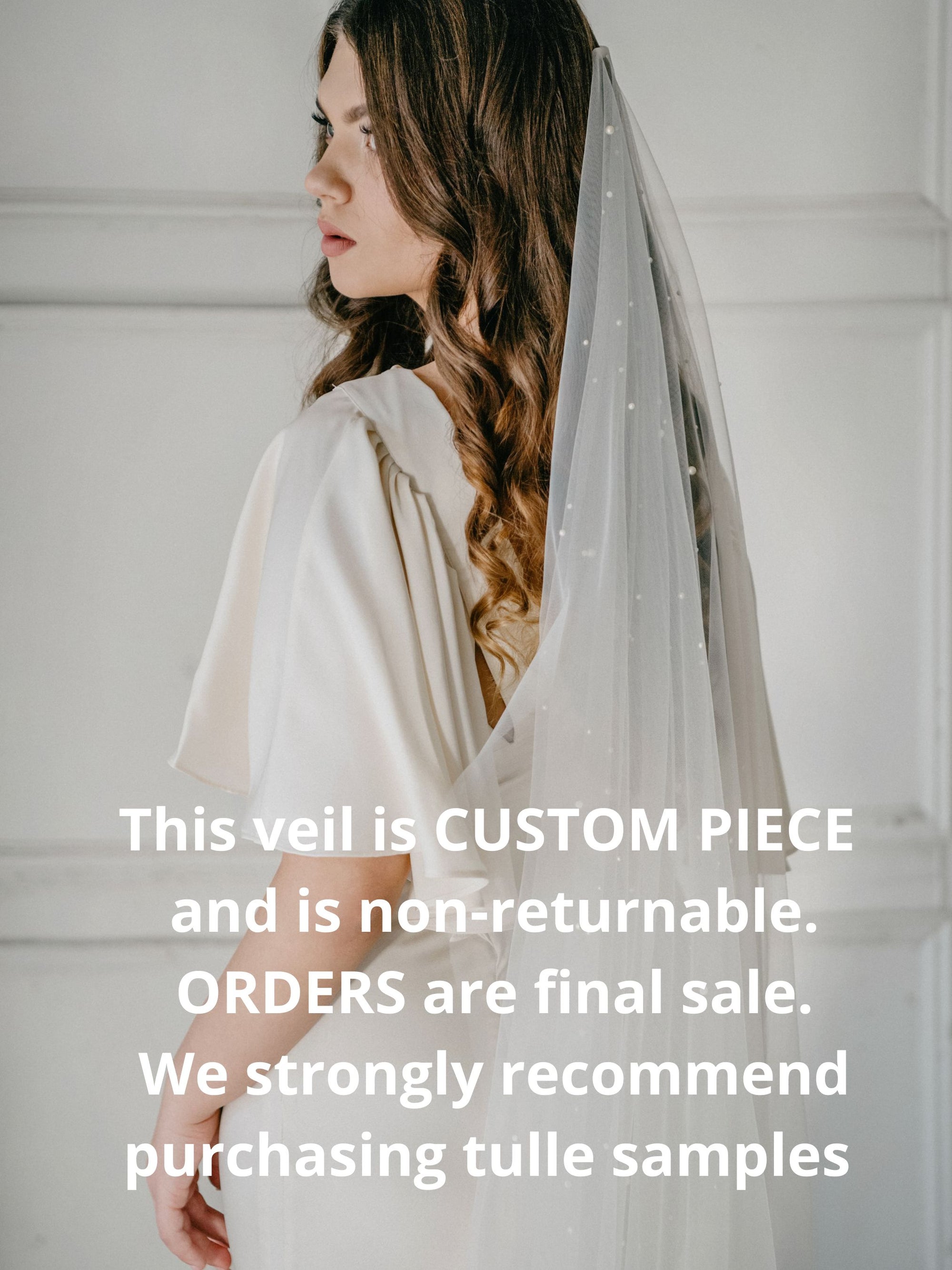 Bride wearing AUGUSTE pearl wedding veil with scattered pearls on soft Italian tulle, modern one-tier bridal look