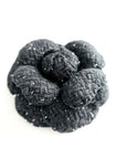 Handmade black tweed camellia brooch with subtle silver sparkles, textured fabric flower pin for blazer or coat