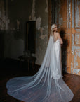 Back view of IRIS 300cm wide blue ombre veil, highlighting the airy volume and gathered comb attachment.