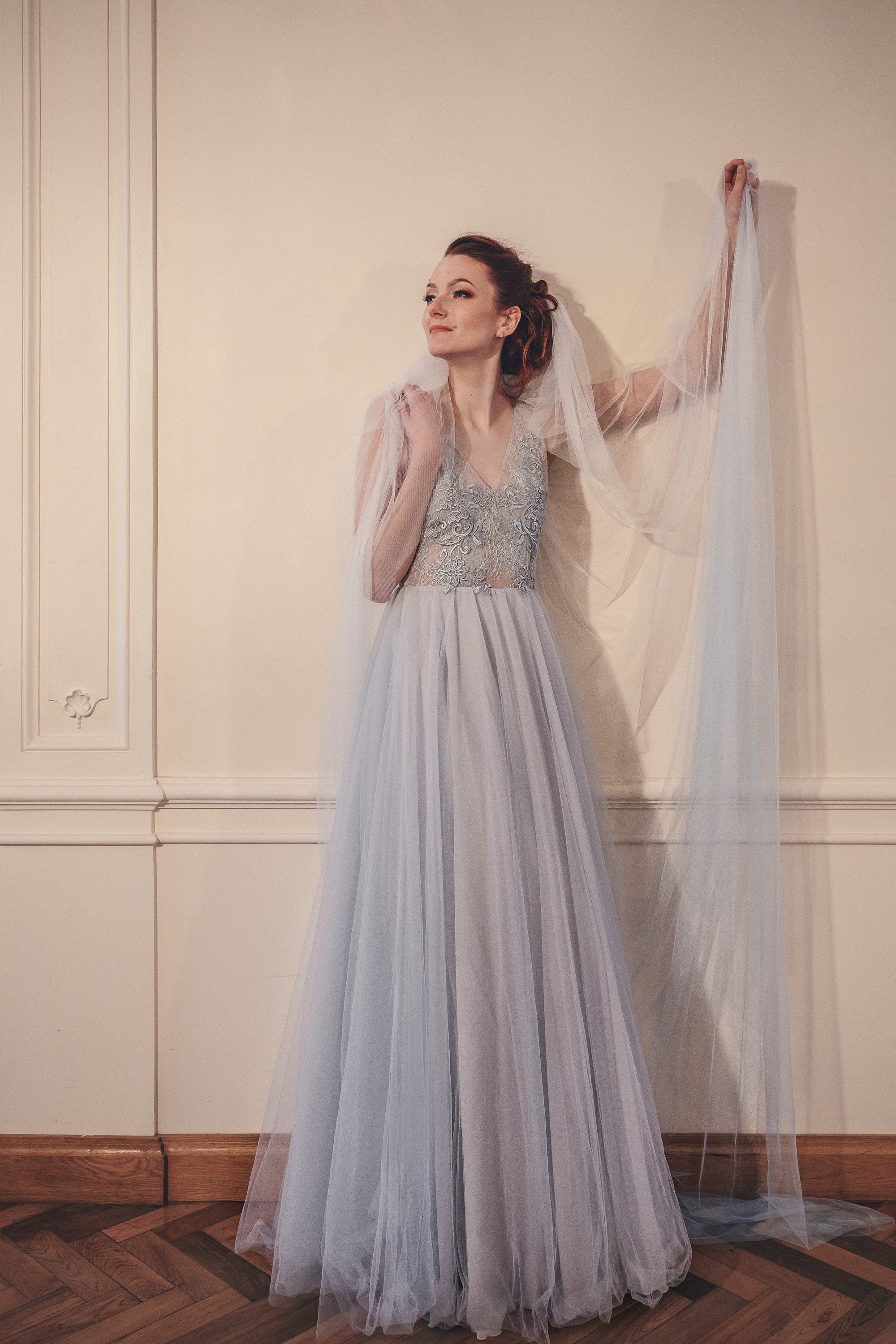 IRIS blue ombre wedding veil in soft English tulle, featuring a custom dip-dyed gradient from ivory to dusty blue with a 300cm wide chapel length silhouette.