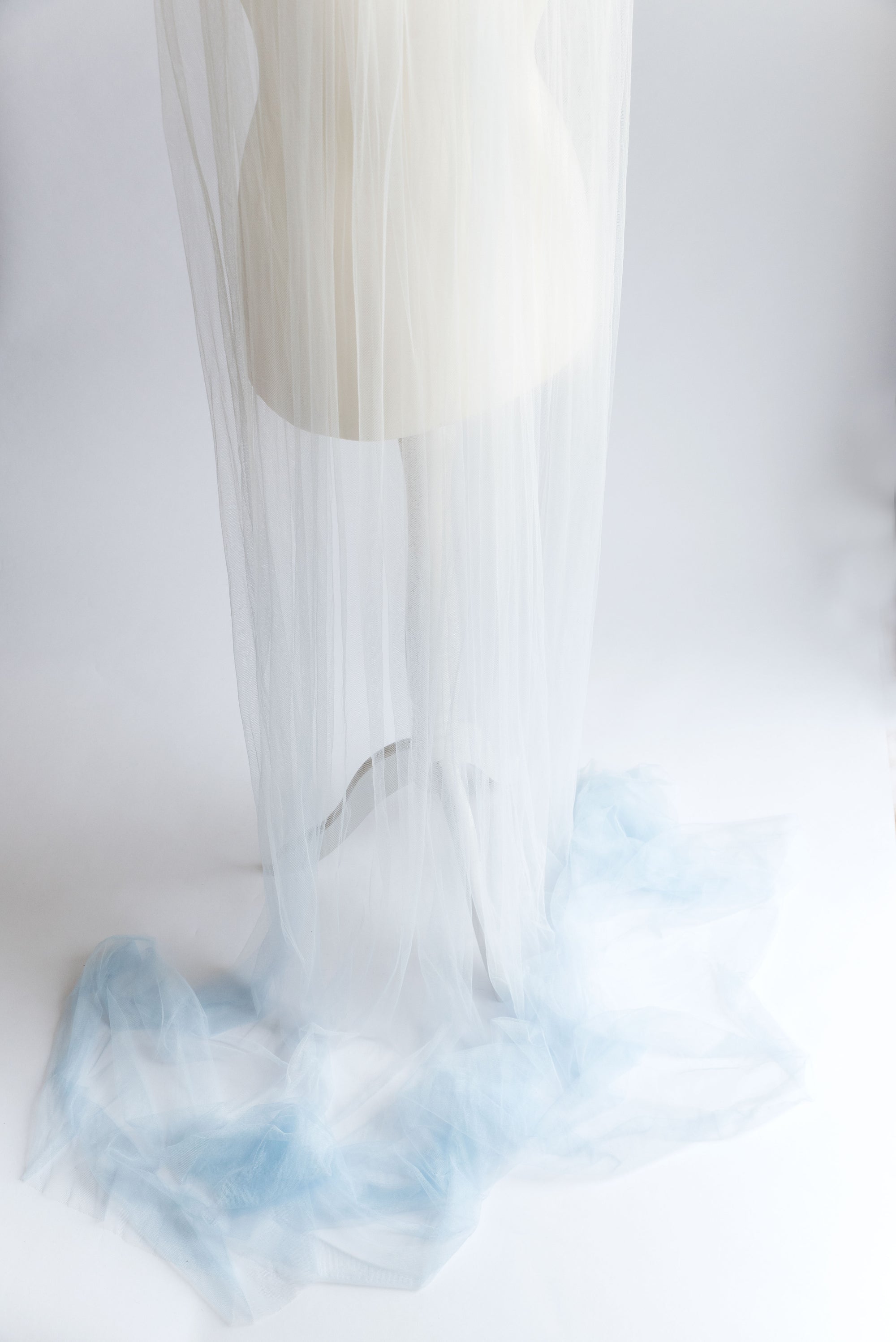 IRIS wedding veil hem showing the smooth dip-dyed color transition on English tulle.