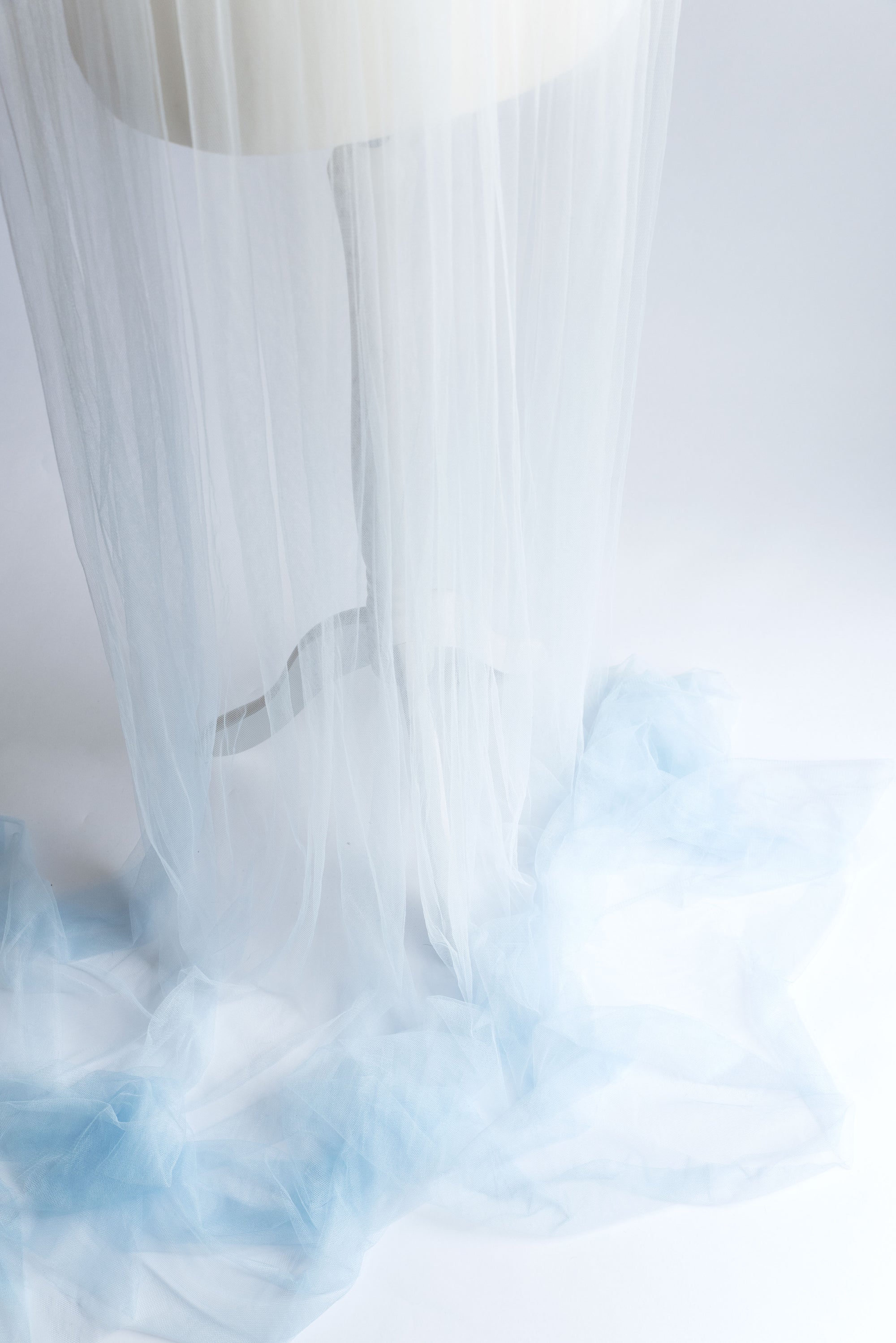 IRIS wedding veil hem showing the smooth dip-dyed color transition on English tulle.