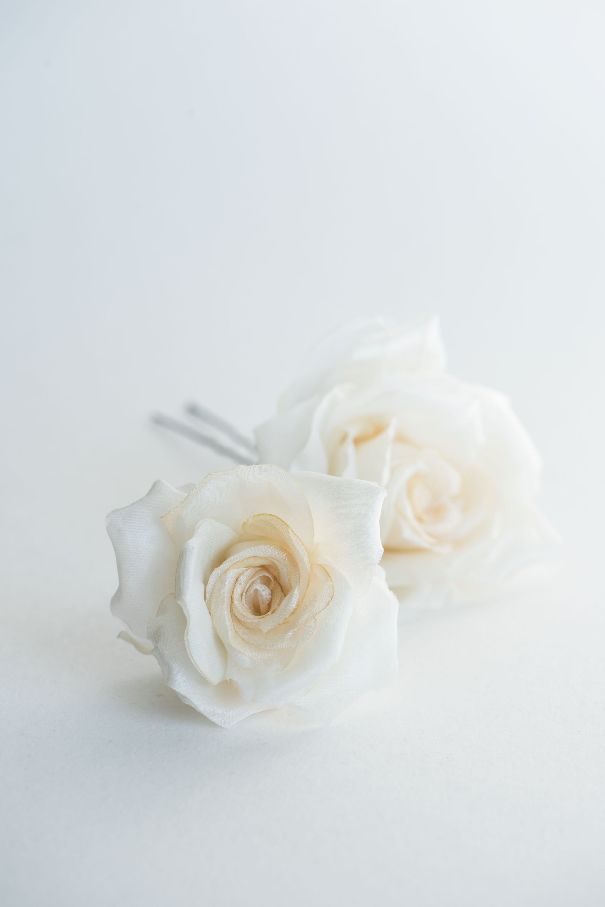two Rosalia hair flowers
