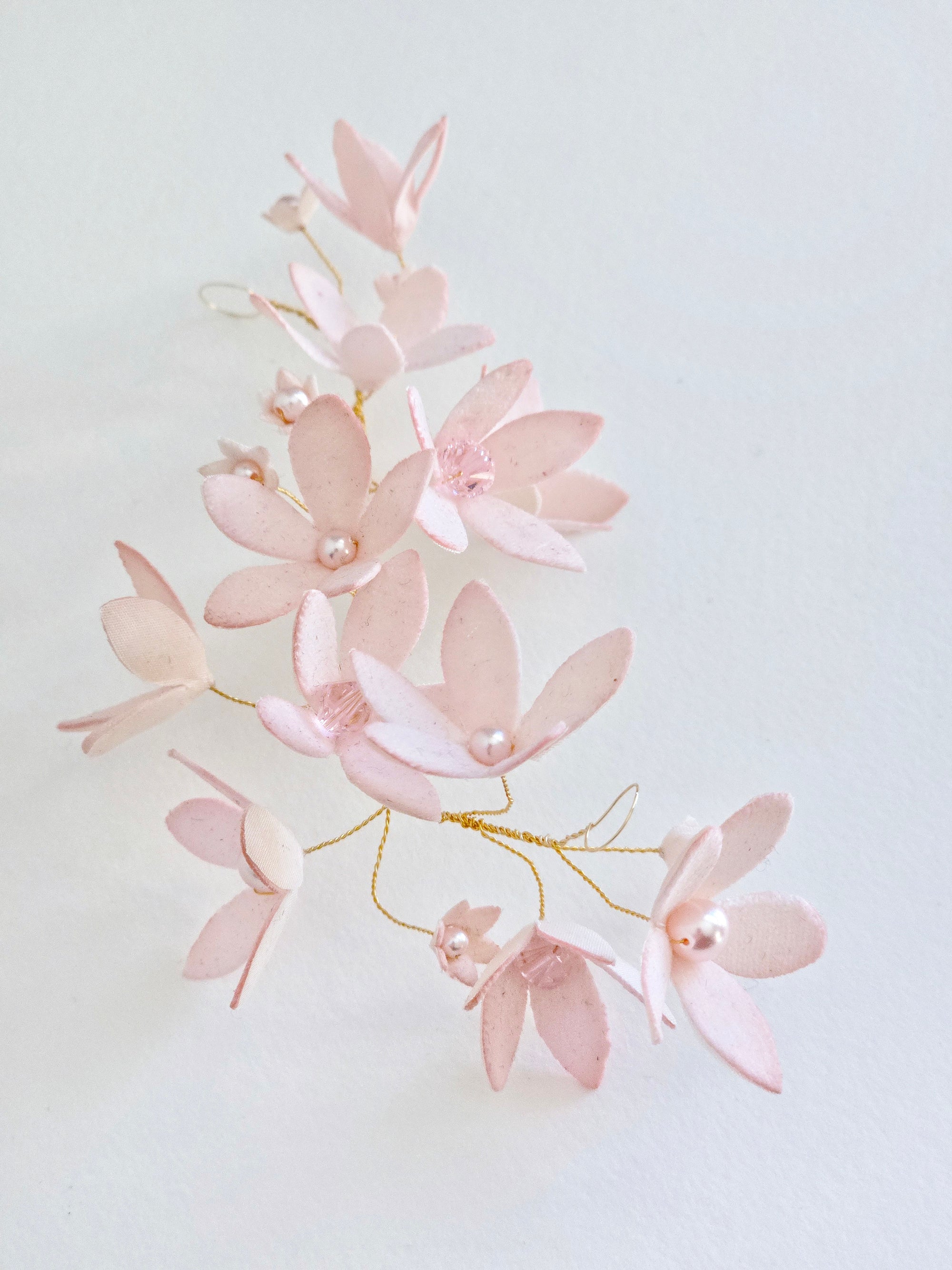 Blush pink hand-dyed velvet floral hair accessory, showing custom color matching.