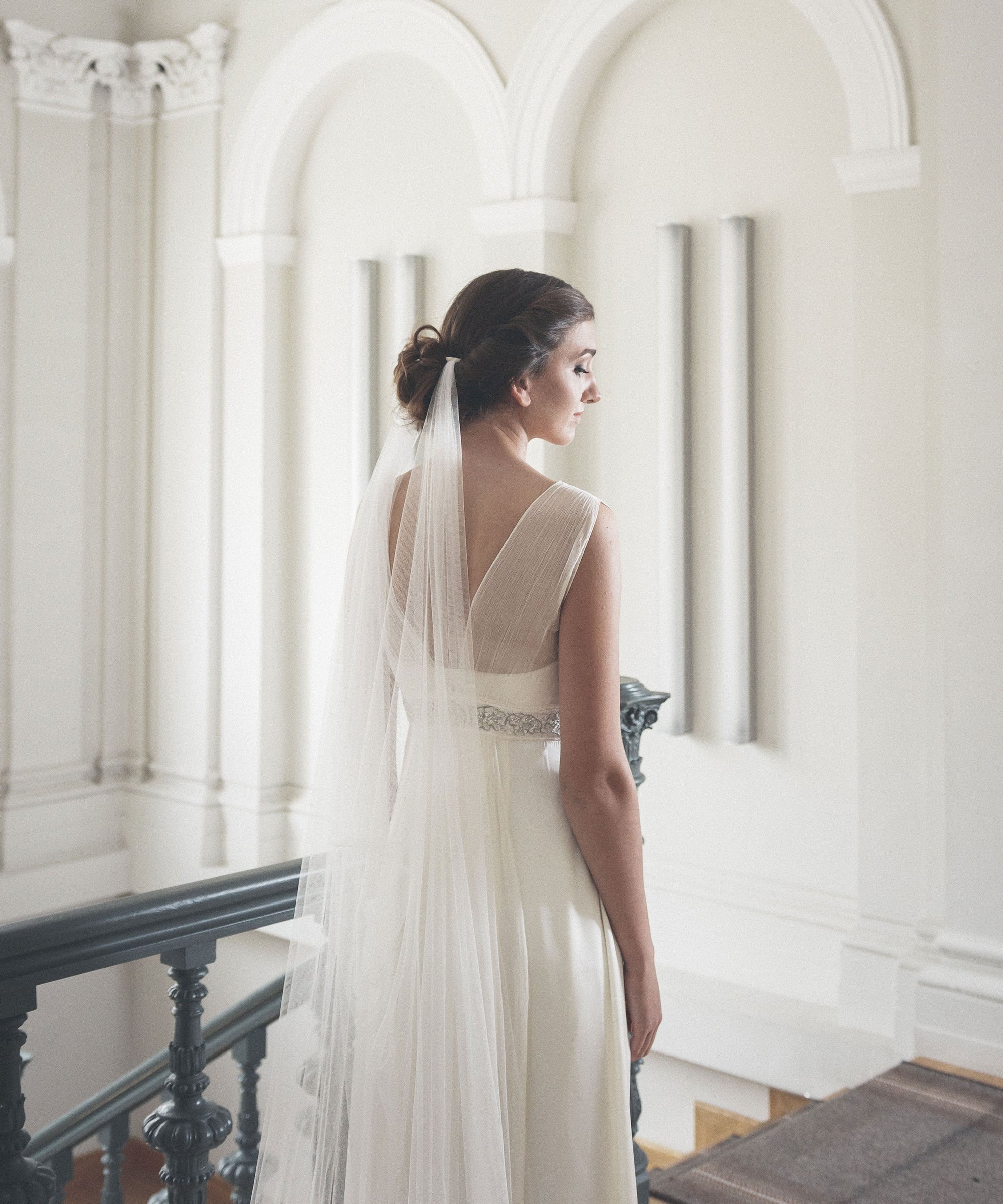 Side view of Elizabeth draped veil, architectural hexagonal weave English tulle, minimalist bridal silhouette.