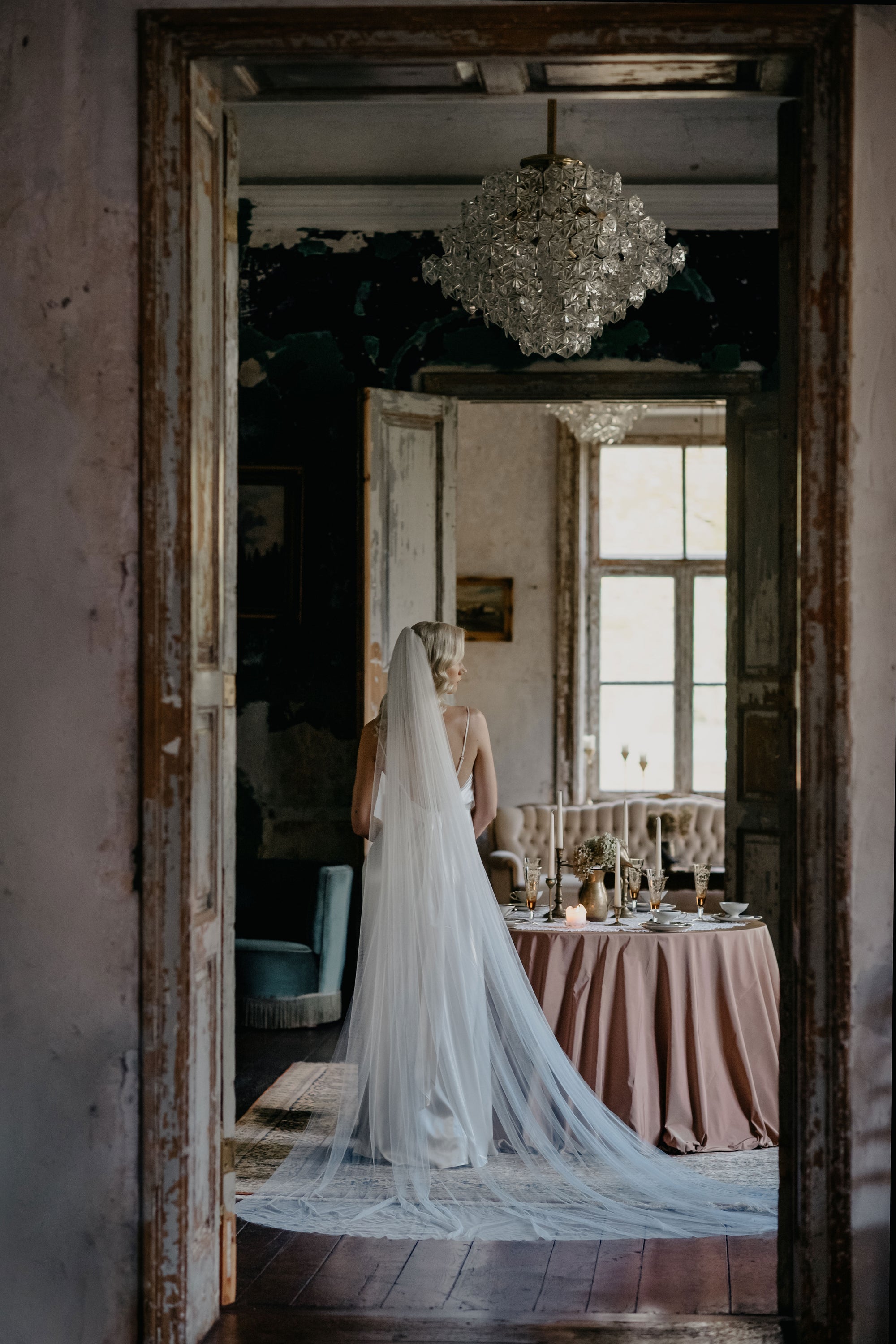 IRIS blue ombre wedding veil in soft English tulle, featuring a custom dip-dyed gradient from ivory to dusty blue with a 300cm wide chapel length silhouette.