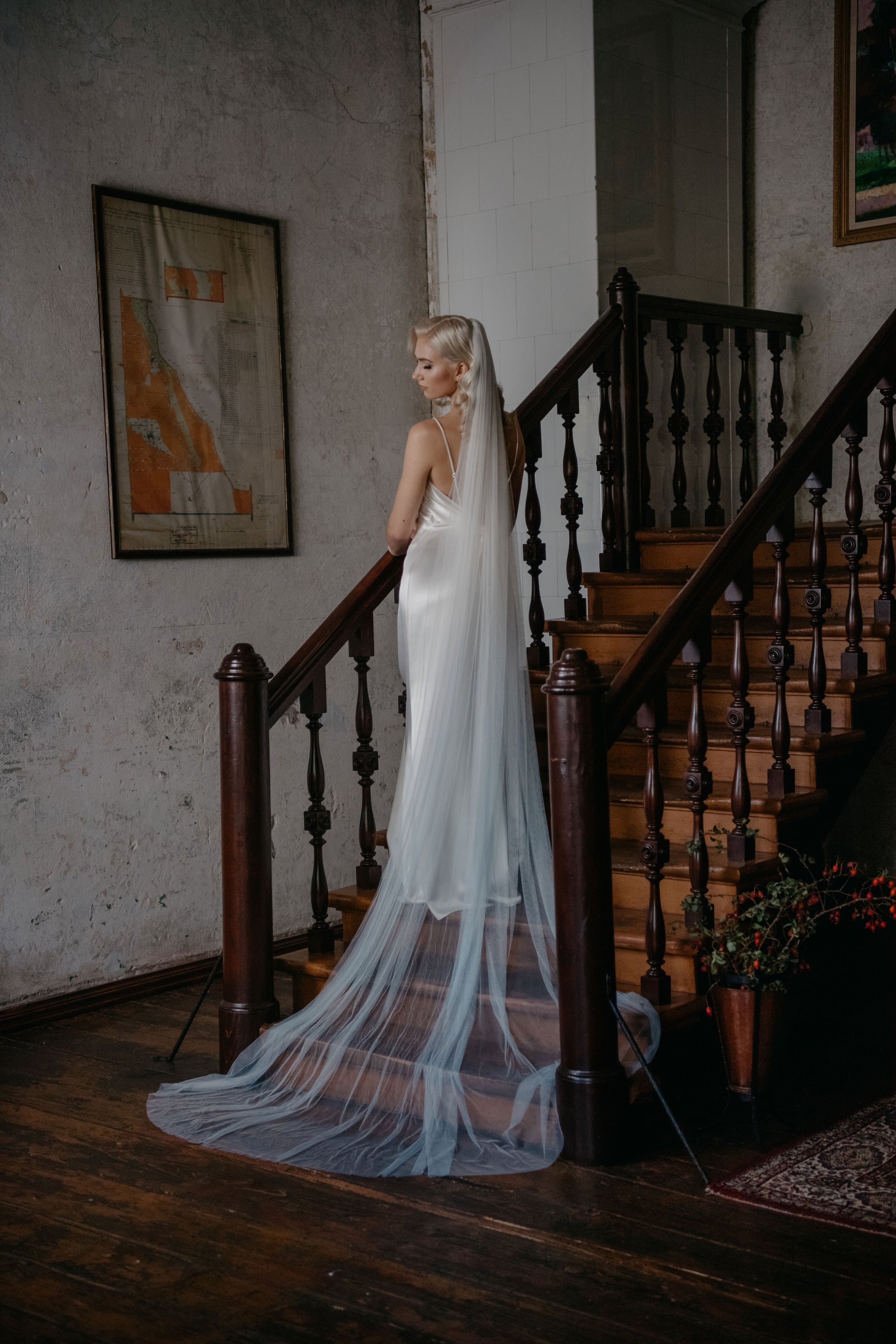 Back view of IRIS 300cm wide blue ombre veil, highlighting the airy volume and gathered comb attachment.