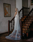Back view of IRIS 300cm wide blue ombre veil, highlighting the airy volume and gathered comb attachment.