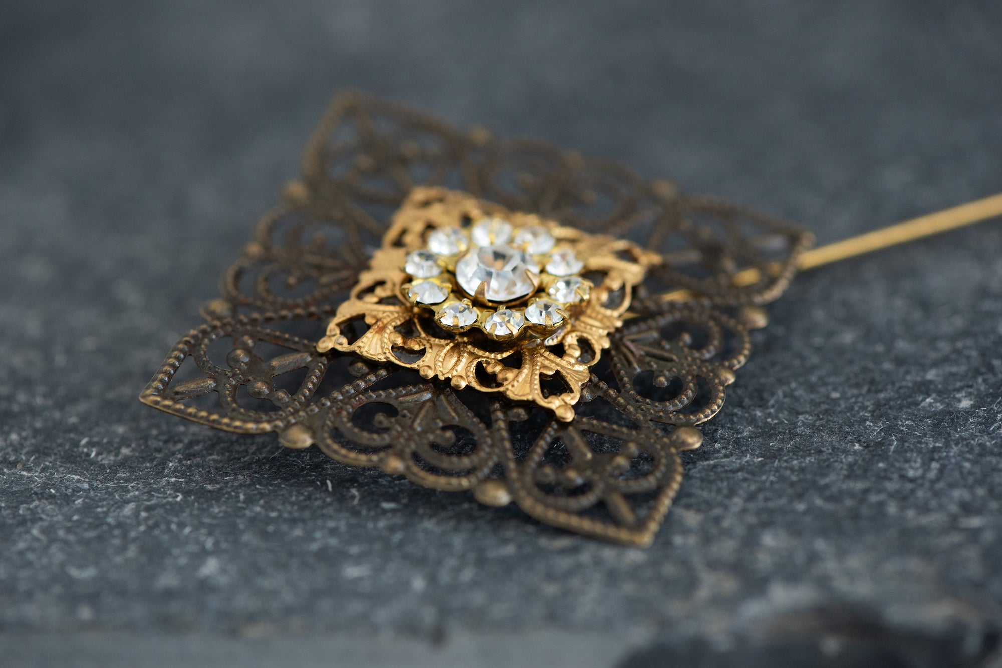 Brass boutonniere for groom with filigree and crystal