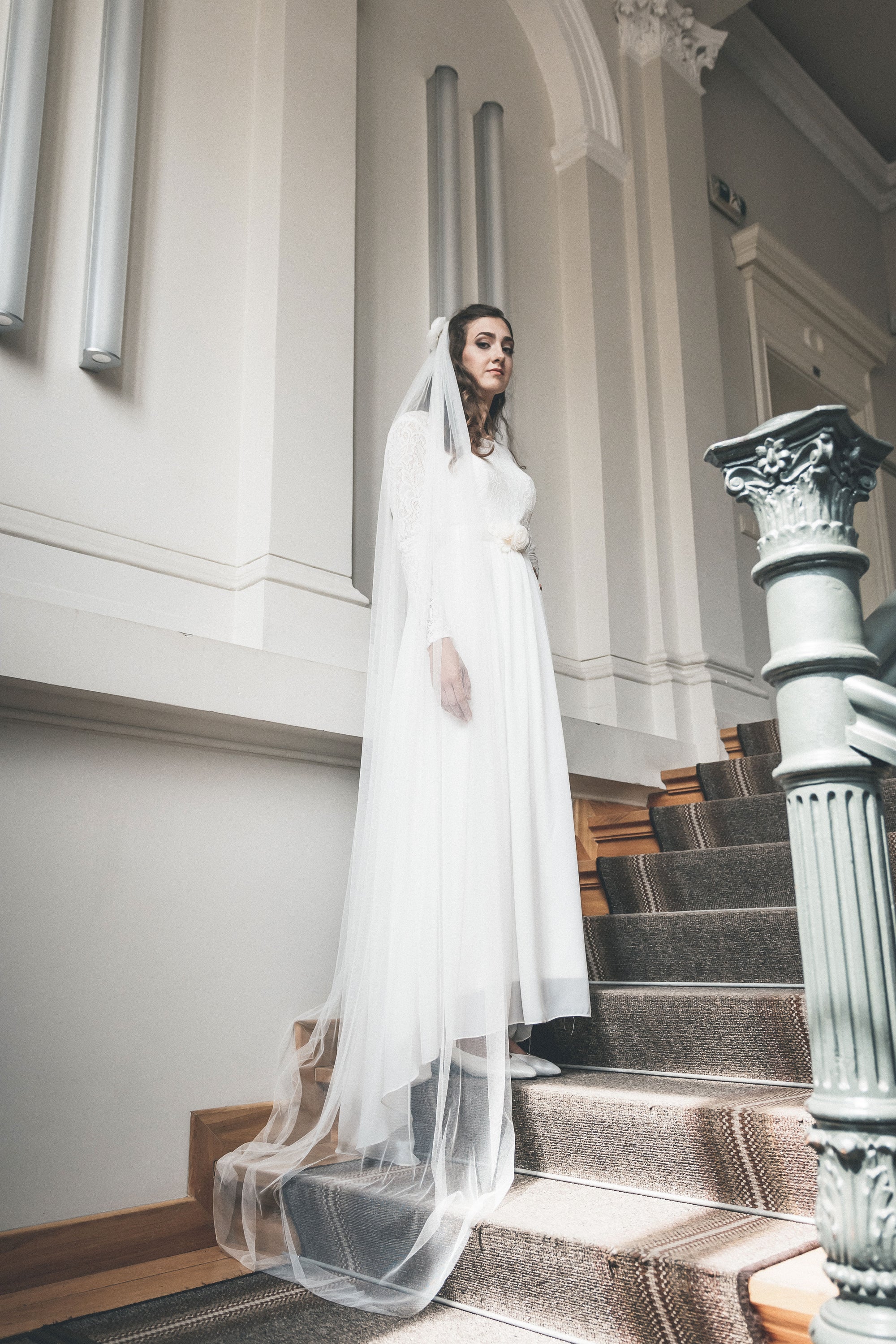 Lightweight narrow English tulle wedding veil — raw curved edge detail