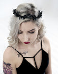 Lifestyle shot of the LZZY black crown integrated into loose wavy hair, showing the lightweight and secure fit of the bridal headband.