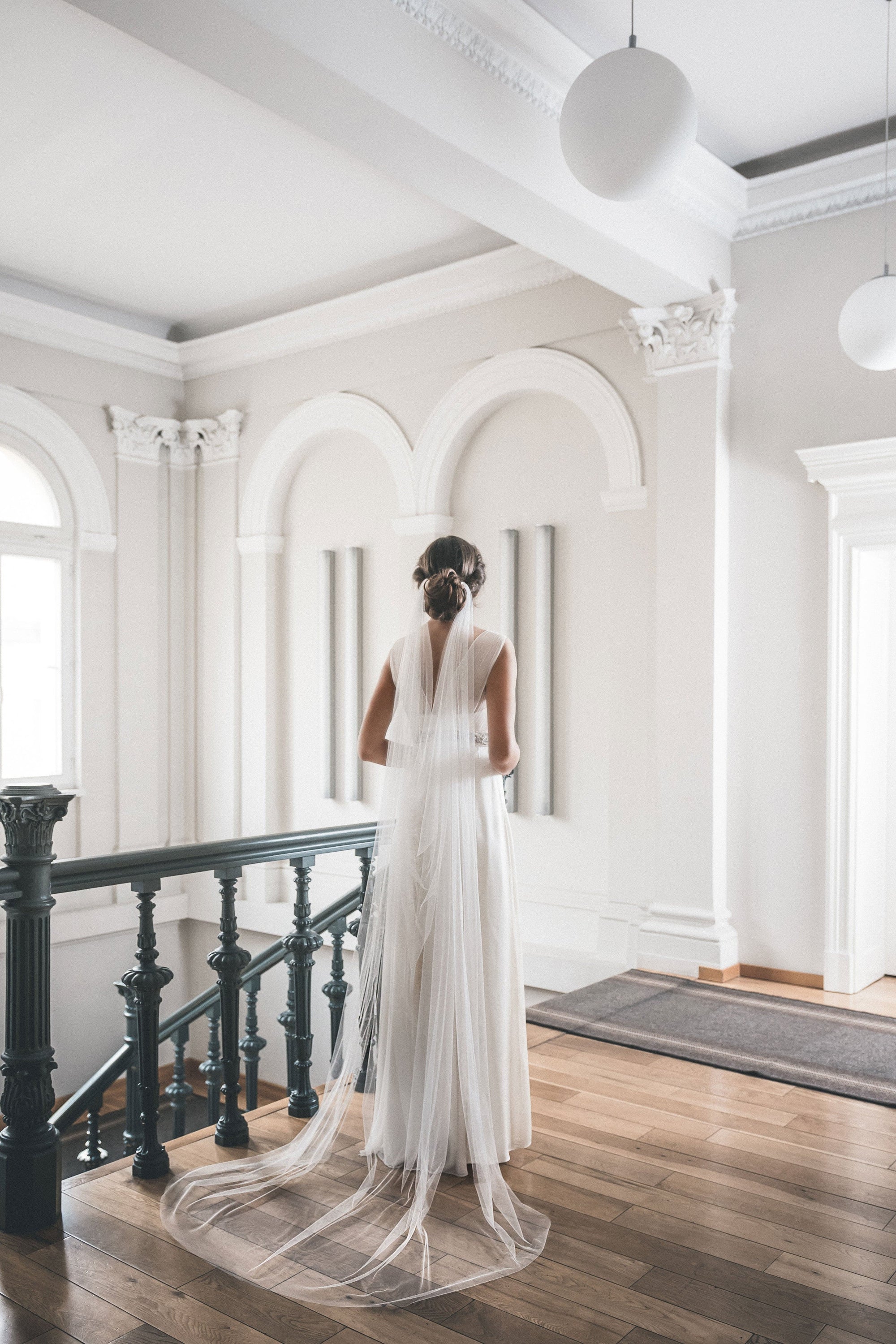 Full length cathedral wedding veil draped gracefully, handmade English tulle bridal veil