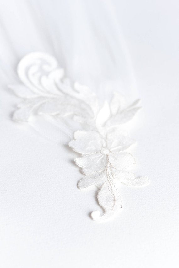 Venice lace border with silver thread detail on bridal cape veil