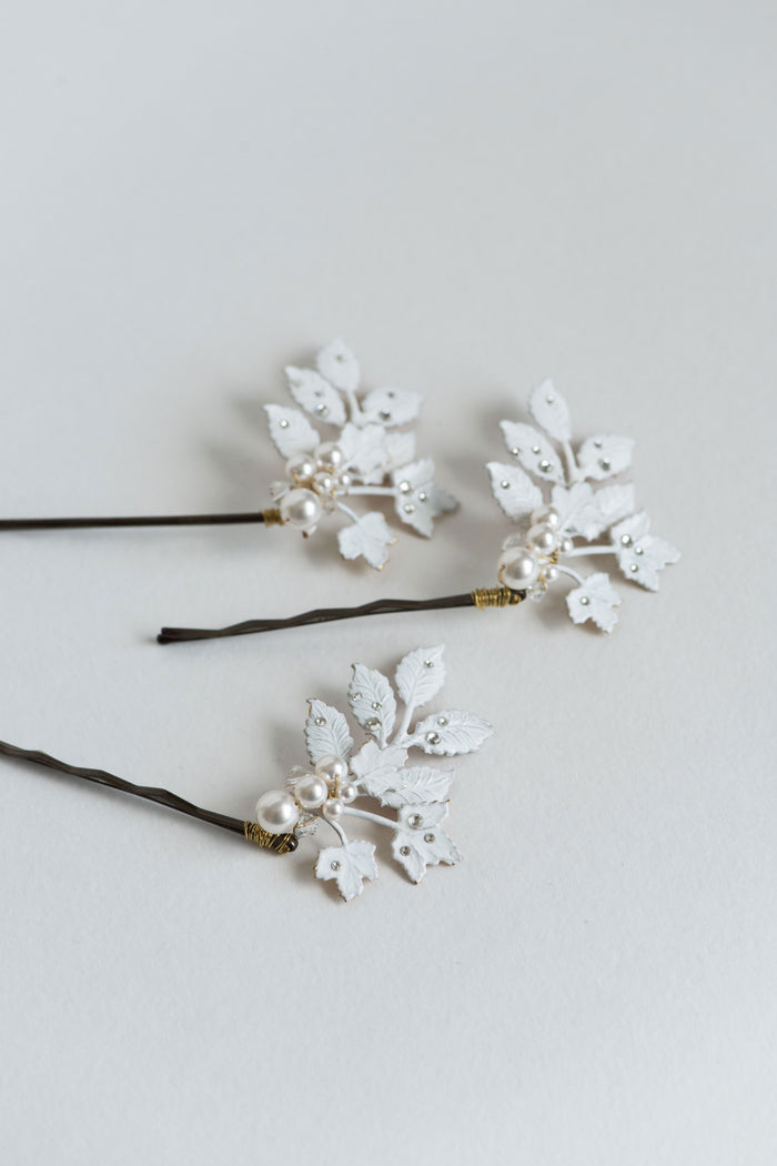 White bridal hair pins with crystals and pearls
