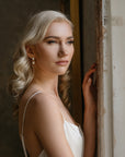 PERELLA baroque pearl drop earrings with white opal crystal and silver setting